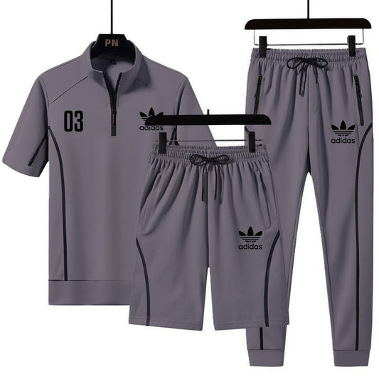 Grey Dry Fit Tracksuits With Black Strips And Front Decent Logo